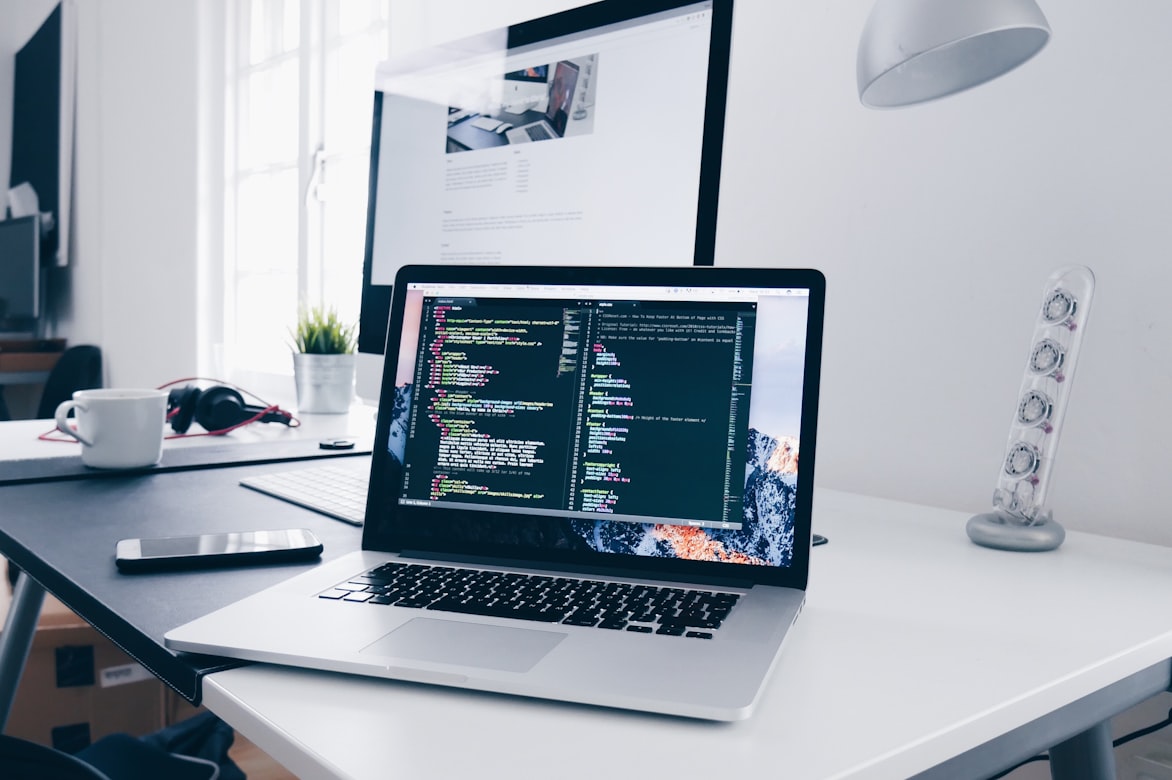 Coding workspace with laptop